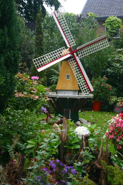 You know your in Holland when you see a windmill and beautiful lush gardens!