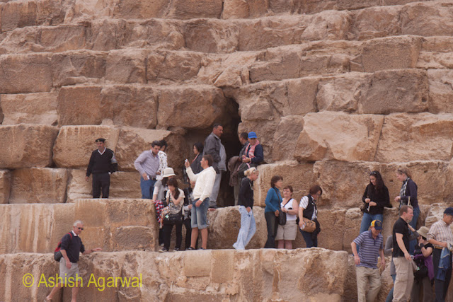 Cairo Pyramids - People at the entrance to the burial chamber