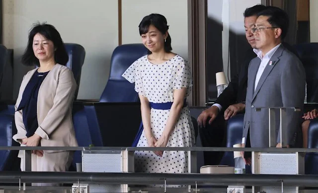 Japanese Princess Kako wore a blue and white polka-dot silk dress. The Girls High School Baseball tournament in Nishinomiya