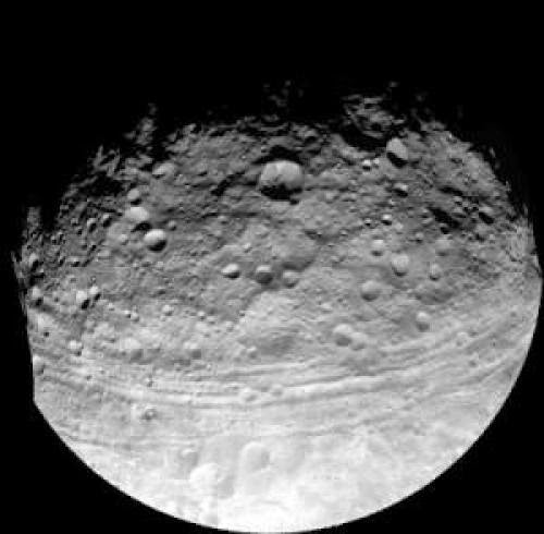 Asteroid Troughs Suggest Stunted Planet