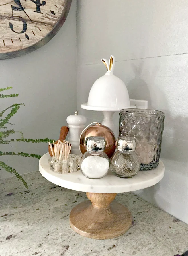 Wood and marble pedestal by stovetop