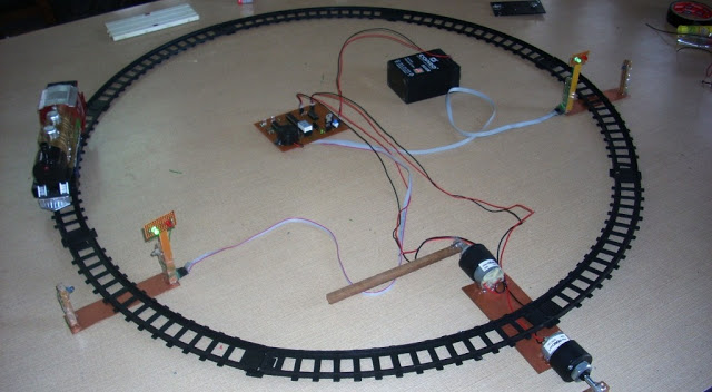 Automatic Railway Gate Control System Using AVR ATmega8  with complete project report, code and circuit diagram.