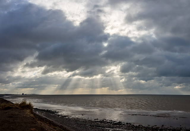 Photo of a wider view of the dramatic sky over the firth