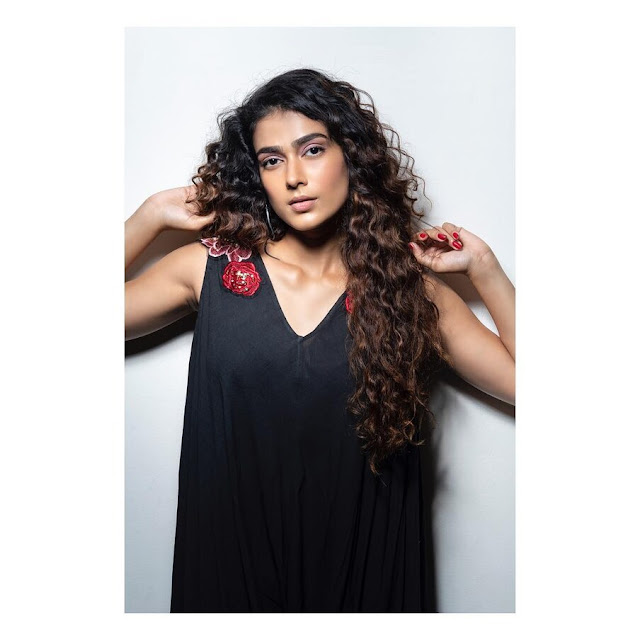 Telugu actress Aakanksha Singh radiates elegance in her latest photoshoot still, showcasing timeless beauty and style.