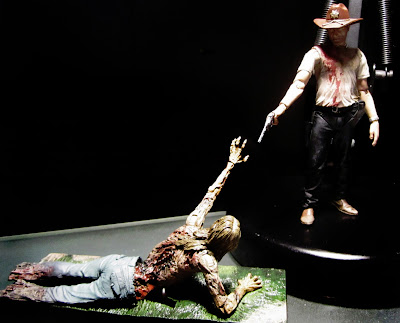 McFarlane Toys The Walking Dead - Rick Grimes and Bicycle Girl Zombie figures