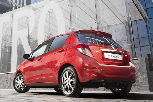 Rear 3/4 view of 2012 Toyota Yaris in urban setting