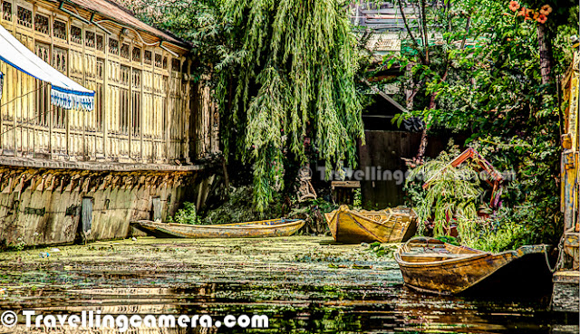 Dal Lake is one of the most popular lakes of India, which is located in Srinagar, the summer capital of Jammu and Kashmir. The urban lake, which is the second largest in the state, is integral to tourism and recreation in Kashmir and is nicknamed the 'Jewel in the crown of Kashmir' or 'Srinagar's Jewel'. The lake is also an important source for commercial operations in fishing and water plant harvesting.The shore line of the lake is encompassed by a boulevard lined with Mughal era gardens, parks, houseboats and hotels. Scenic views of the lake can be witnessed from the shore line Mughal gardens, such as Shalimar Bagh and Nishat Bagh built during the reign of Mughal Emperor Jahangir) and from houseboats cruising along the lake in the colourful shikaras. Dal Lake has some Floating gardens as well. The floating gardens, known as 'Rad' in Kashmiri, blossom with lotus flowers during July and August. The wetland is divided by causeways into four basins - Gagribal, Lokut Dal, Bod Dal and Nagin (although Nagin is also considered as an independent lake). During our trip to Shrinagar, we stayed in a hotel around Nagin lake only. Oldest Five star of the city is located on the bank of Nagin Lake. Lokut-dal and Bod-dal each have an island in the centre, known as Rup Lank (or Char Chinari) and Sona Lank respectively.  There are some personal houses around Dal Lake and people have their own boats to travel from one place to another for getting stuff from Lake-Market, which is again located inside Dal Lake only. Houseboats and the Dal Lake are widely associated with Srinigar and are nicknamed 'floating palaces', built according to British customs.The houseboats are generally made from local cedar-wood and are graded in a similar fashion to hotels according to level of comfort.Many of them have lavishly furnished rooms, with verandas and a terrace to serve as a sun-deck or to serve evening cocktails.They are mainly moored along the western periphery of the lake, close to the lakeside boulevard in the vicinity of the Dal gate and on small islands in the lake. They are anchored individually, with interconnecting bridges providing access from one boat to the other.The kitchen-boat is annexed to the main houseboat, which also serves as residence of the boatkeeper and his family.Many boats on Dal Lake are used for selling stuff to tourists. Anything like Artificial Jewellery, Corns, Fruits, Cloths, Wooden Articles, Flowers etc. Some of the vendors can be seen selling digital-cards for still/video cameras.        Each houseboat has an exclusive shikara for ferrying guests to the shore. A shikara is small paddled taxi boat, often about 15 feet and made of wood with a canopy and a spade shaped bottom.It is the cultural symbol of Kashmir and is used not only for ferrying visitors but is also used for the vending of fruits, vegetables and flowers and for the fishing and harvesting of aquatic vegetation.All gardens in the lake periphery and houseboats anchored in the lake are approachable through shikaras.The boats are often navigated by two boatmen dressed in 'Phiron' (traditional dress) and carry 'Kangris' or portable heaters on the boat.A shikara can seat about six people and have heavily cushioned seats and backrests to provide comfort in Mughul style.All houseboat owners provide shikara transport to their house guests free of charge. The shikara is also used to provide for other sightseeing locations in the valley, notably a cruise along the Jhelum River, offering scenic views of the Pir Panjal mountains and passing through the famous seven bridges and the backwaters enroute.