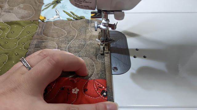 Binding a patchwork quilt by machine