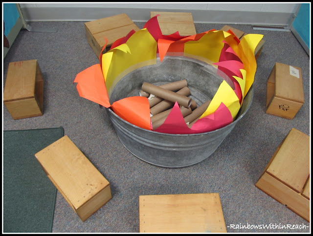 photo of: Camping Learning Center at Preschool with Fire Pit for Summer Fun