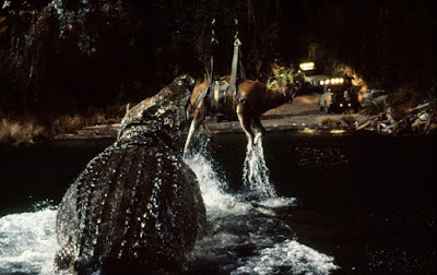 Lake Placid 1999 horror movie still crocodile eating cow