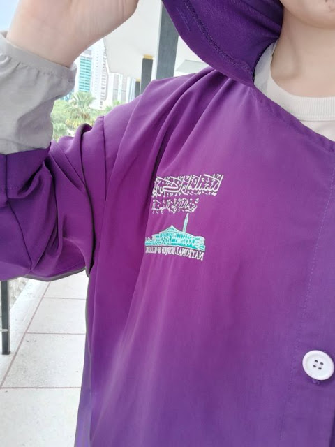 I have to wear this purple in Masijid Negara