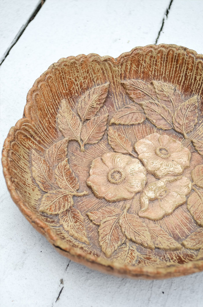 See how a worn out bowl purchased for $3 at the thrift store is given a farmhouse style makeover with paint and antiquing wax.  |  www.andersonandgrant.com
