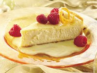 Luscious Orange Cheesecake with Raspberries