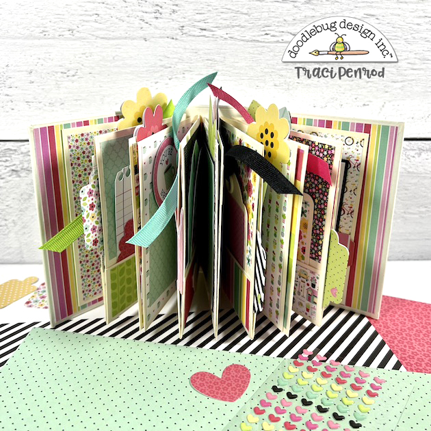 Friend scrapbook album with open pages, ribbon and flowers