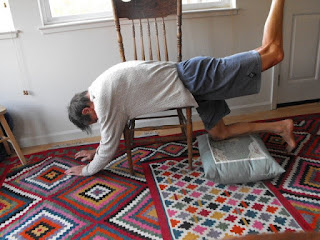 chair kneeling and back arching