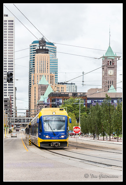 A Metro Blue Line Train heads south on South 5th Street in Minneapolis, MN