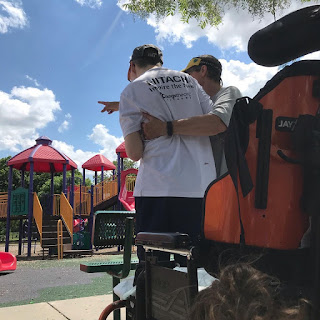 Chris standing up outside at the park in OKC