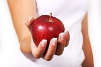 Una mela rossa contro il cancro al seno
