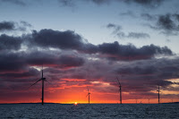 An offshore wind farm in the United Kingdom. (Credit: Aaron Crowe/flickr) Click to Enlarge.