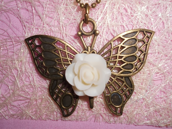 mariposa con rosa de marfil