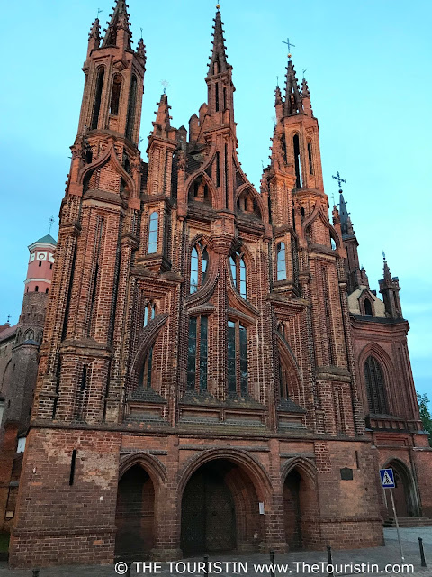 The Gothic Facade of Saint Anne’s church in Vilnius in Lithuania in the blue hour.