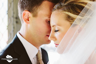 Laura and David standing cheek to cheek at the Salish Lodge and Spa