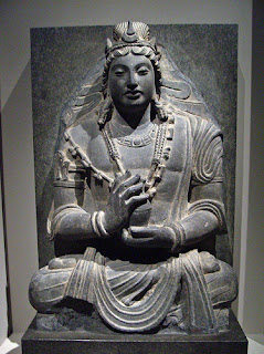 Bodhisattva Maitreya. Just as Gautama Buddha passed through over five hundred lives as a Bodhisattva lone who is irrevocably on the path to becoming a Buddha), so the next Buddha, Maitreya, who will be born five thousand years after the passing of Gautama, already exists as a Bodhisattva and was present when Gautama first turned the Wheel of the Law. Nepalese bronze, thirteenth century. Victoria and Albert Museum, London. 