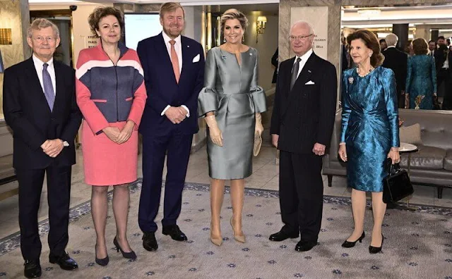 Queen Maxima wore a satin dress by Natan. Princess Victoria wore a botanic dress by Rodejber. Shourouk earrings