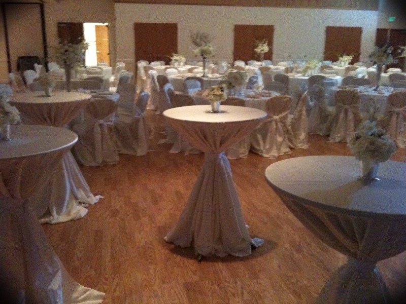 We used ivory Lamour chair covers and white Bengaline chair ties for a 