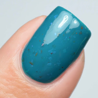 teal nail polish with color shifting flakies