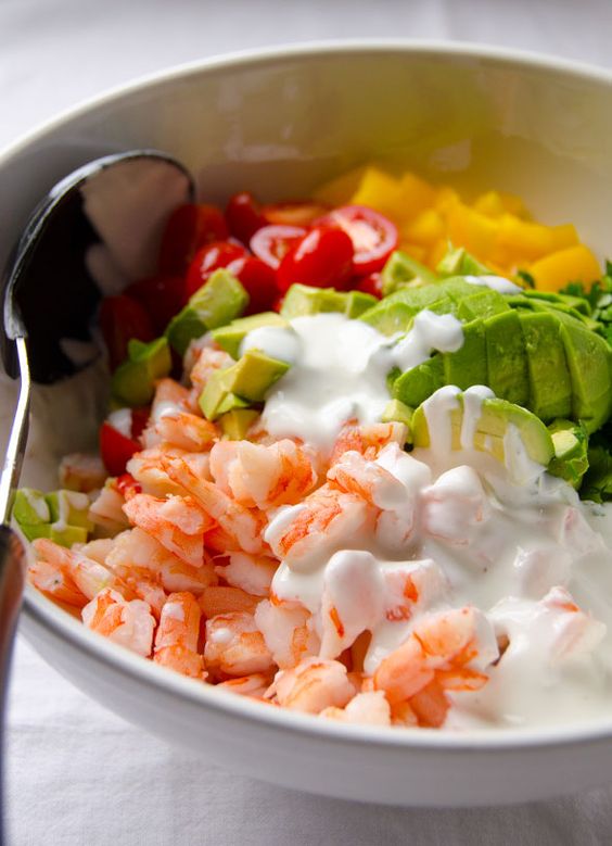 Chop vegetables and add them to a large salad bowl Shrimp Avocado Salad