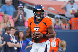 Russell Wilson  and therefore the Denver Broncos agree to a 5-year extension 