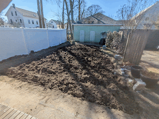 A gif of a few images of the garden from the soil being turned to it being flattened to it being covered.