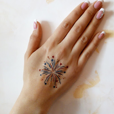 Pretty fake tattoos by Jewel Flash Tattoos: fireworks for Independence Day in the USA