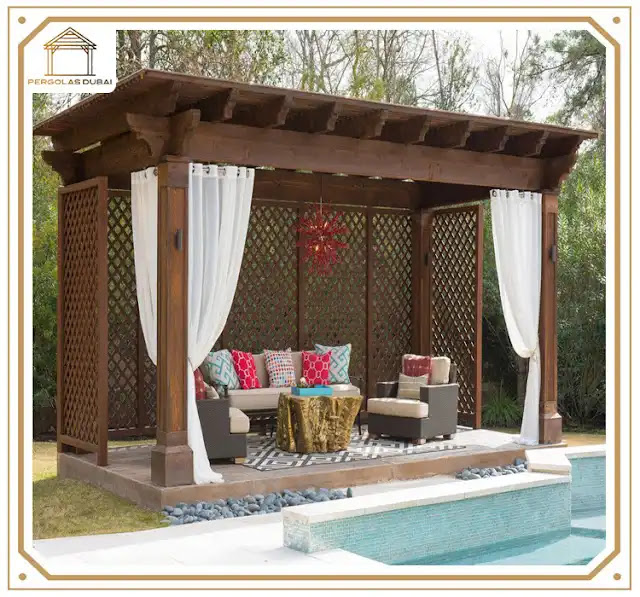 Pergola with Curtains near swimming Pool