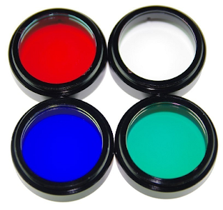 photograph of red, clear, blue, and green filters