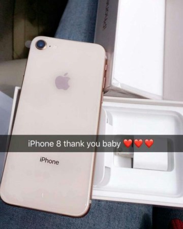 ?My Brother told me to f*ck them and get that money?-   Excited Nigerian Lady shows off dollar bills and Iphone 8 gift