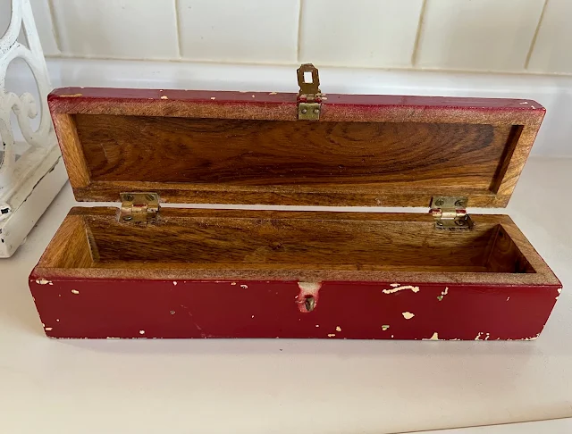 Photo of a wooden hinged box from the thrift store.