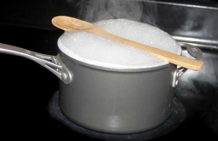 How to stop water pot from boiling over