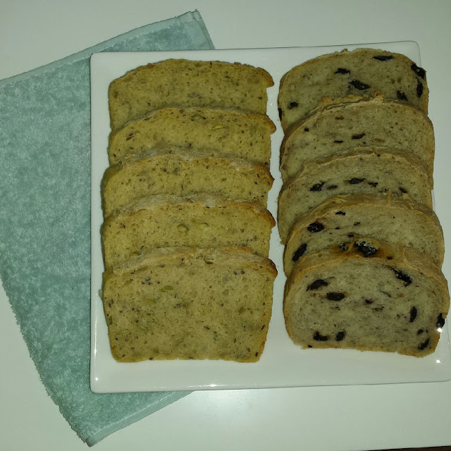 Homemade olive bread and white bread with seeds