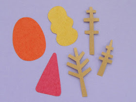 cutting out tree shapes for an autumn card