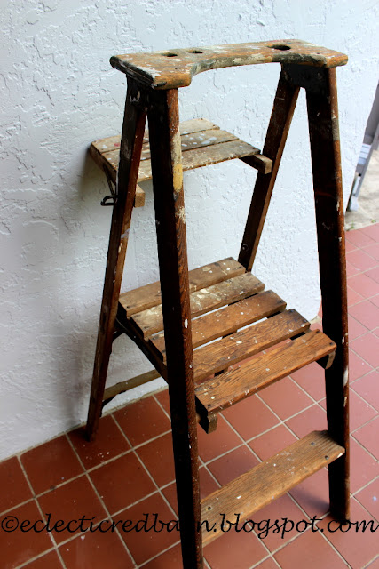 Eclectic Red Barn: Old ladder with platform step and curved top