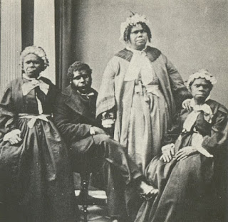 A picture of the last four Tasmanian Aboriginal people of solely Aboriginal descent c. 1860s. Truganini, the last to survive, is seated at far right.