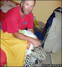 Underwear-clad Israeli Man Tempers  Bed-leaping Leopard