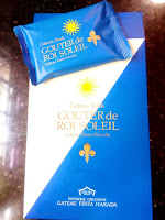 A pleasant royal blue and golden sun for the packaging.