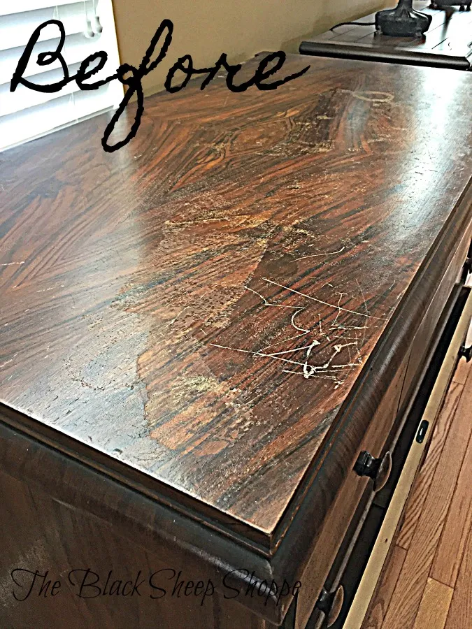 The finish on the top of the dresser is in poor condition, but it's easy to fix.