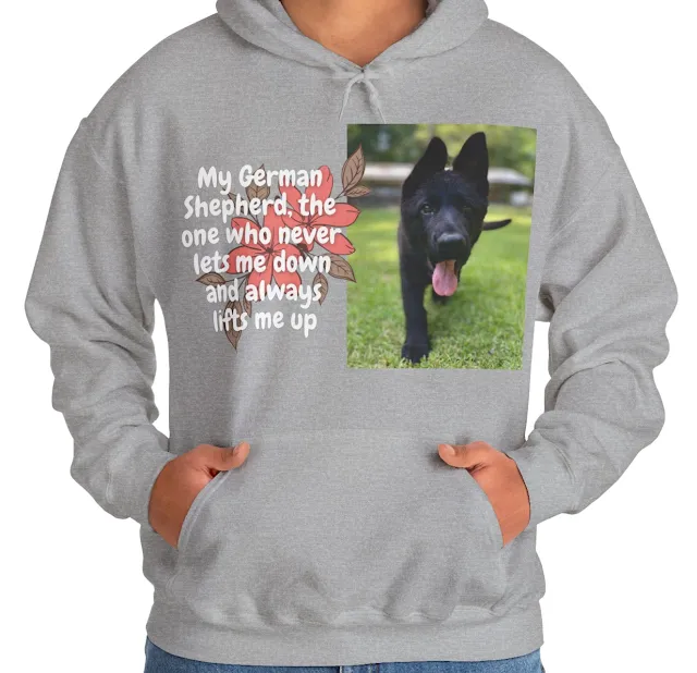 A Hoodie With European Solid Black German Shepherd Puppy Walking On the Grass Leaving Tongue Out and Caption The One Who Never Lets