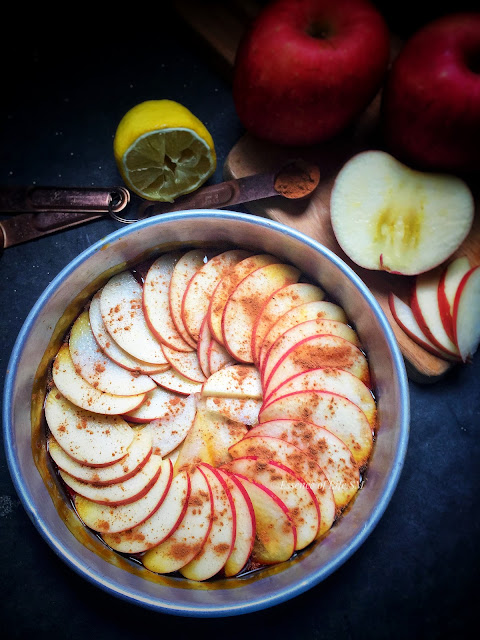 "Golden Bliss: Upside-Down Caramelized Apple Cake topped with a luscious layer of caramelized apples, a sweet treat for all occasions."