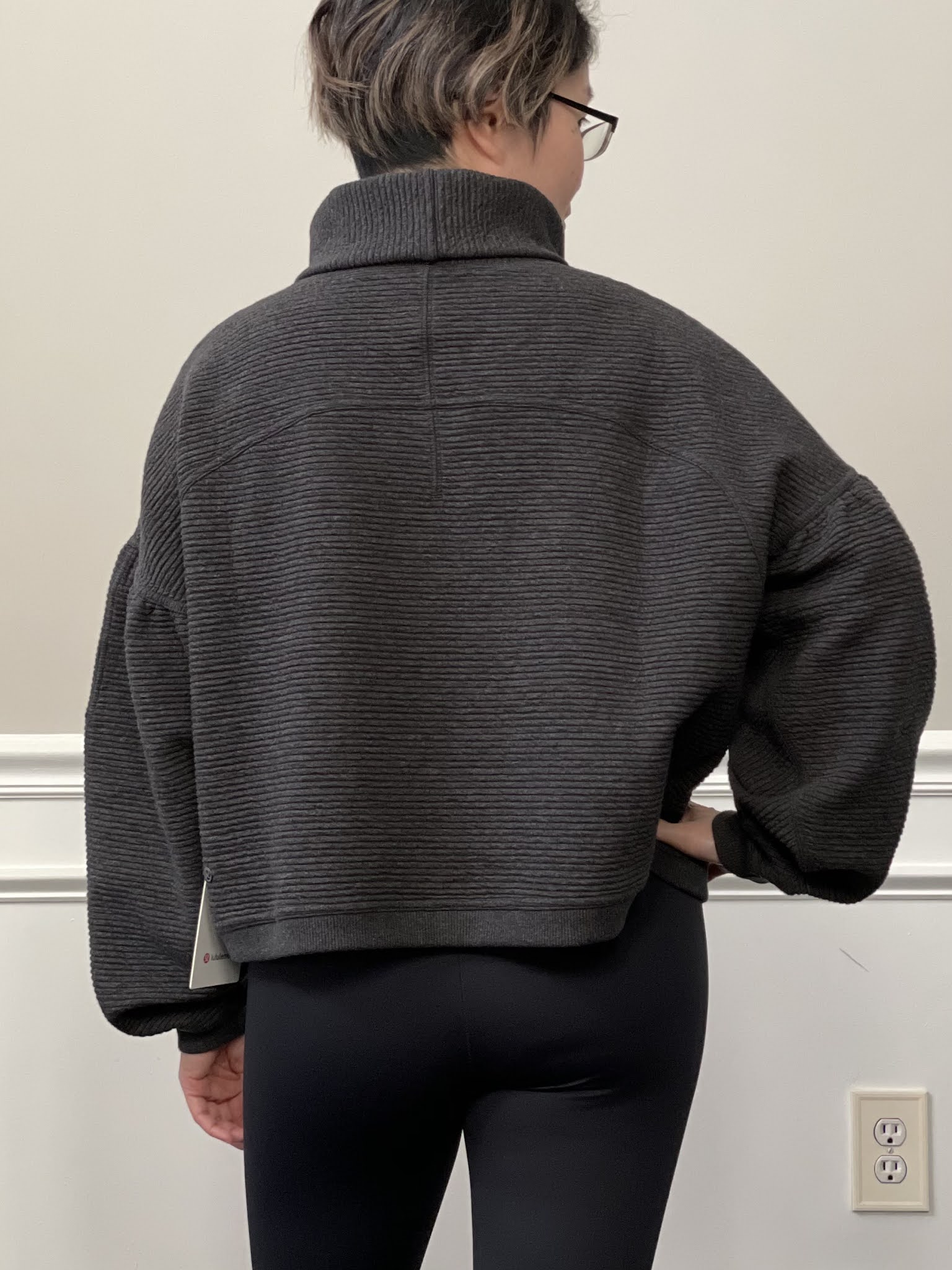 Twist Back-to-Front Pullover in black! Also soft ambition shorts in grey. I  saw a lot of people sizes down but the only size available was my normal  size. I like it but