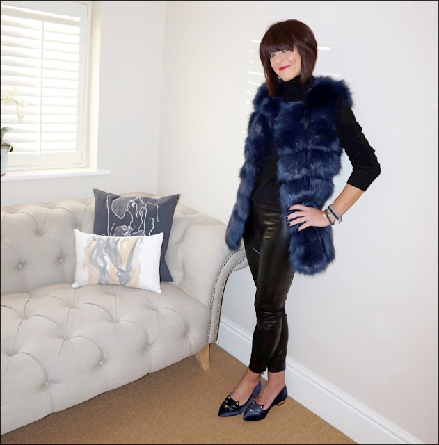 My Midlife Fashion, faux fur gilet, meme london friendship bracelets, marks and spencer pure cashmere polo neck jumper, french connection faux leather trousers, charlotte olympia mid century kitty slippers